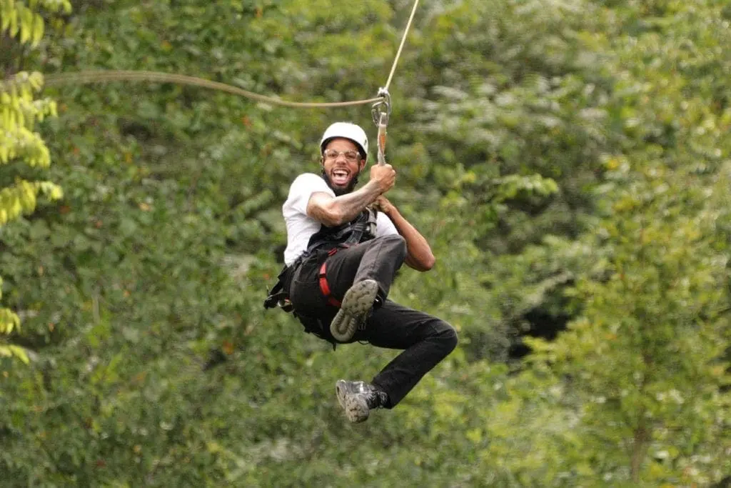 Wahoo Ziplines adventure in the Smoky Mountains, showcasing breathtaking views and ziplining action, Pigeon Forge and Gatlinburg Zipline