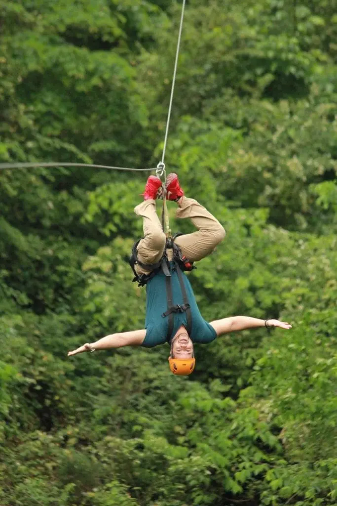 Pigeon Forge and Gatlinburg Zipline, Scenic view of Wahoo Ziplines with lush green trees and zipline course in the Smoky Mountains, perfect for adventure seekers
